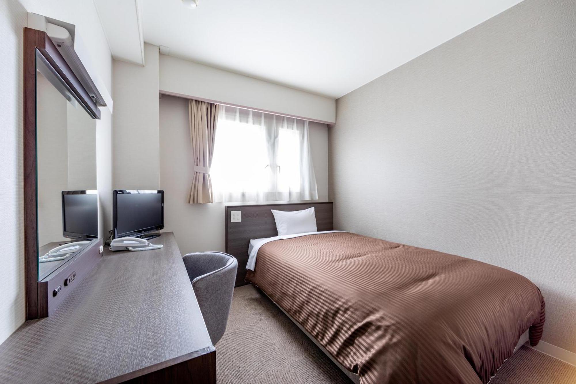 Orange Inn Sendaihigashi Buitenkant foto