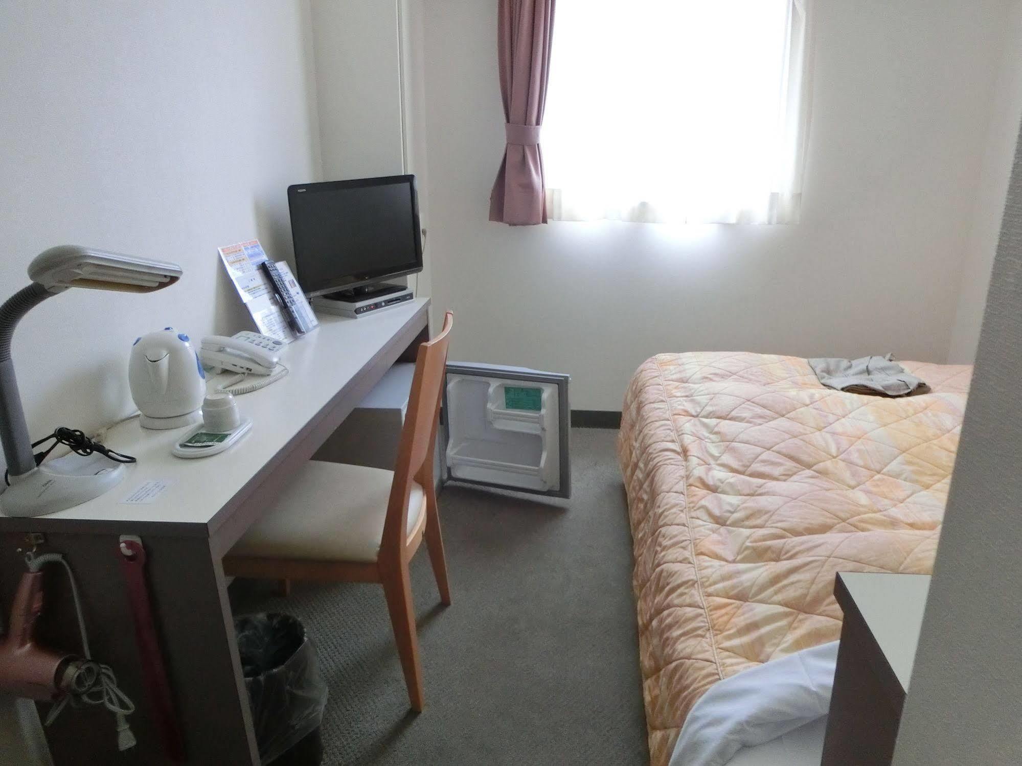 Orange Inn Sendaihigashi Buitenkant foto